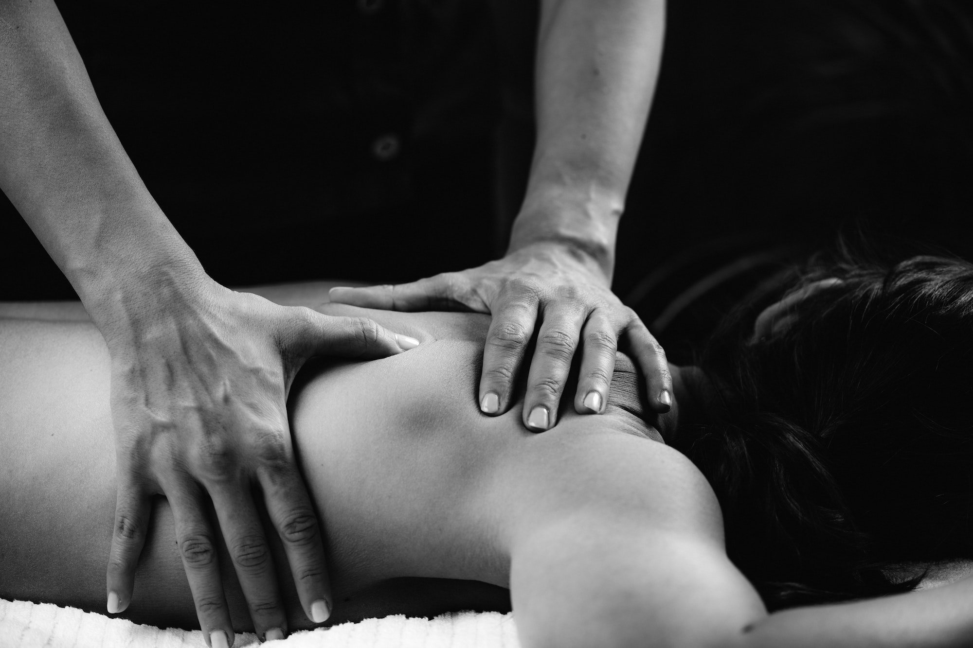 Woman Enjoying Deep Tissue Massage